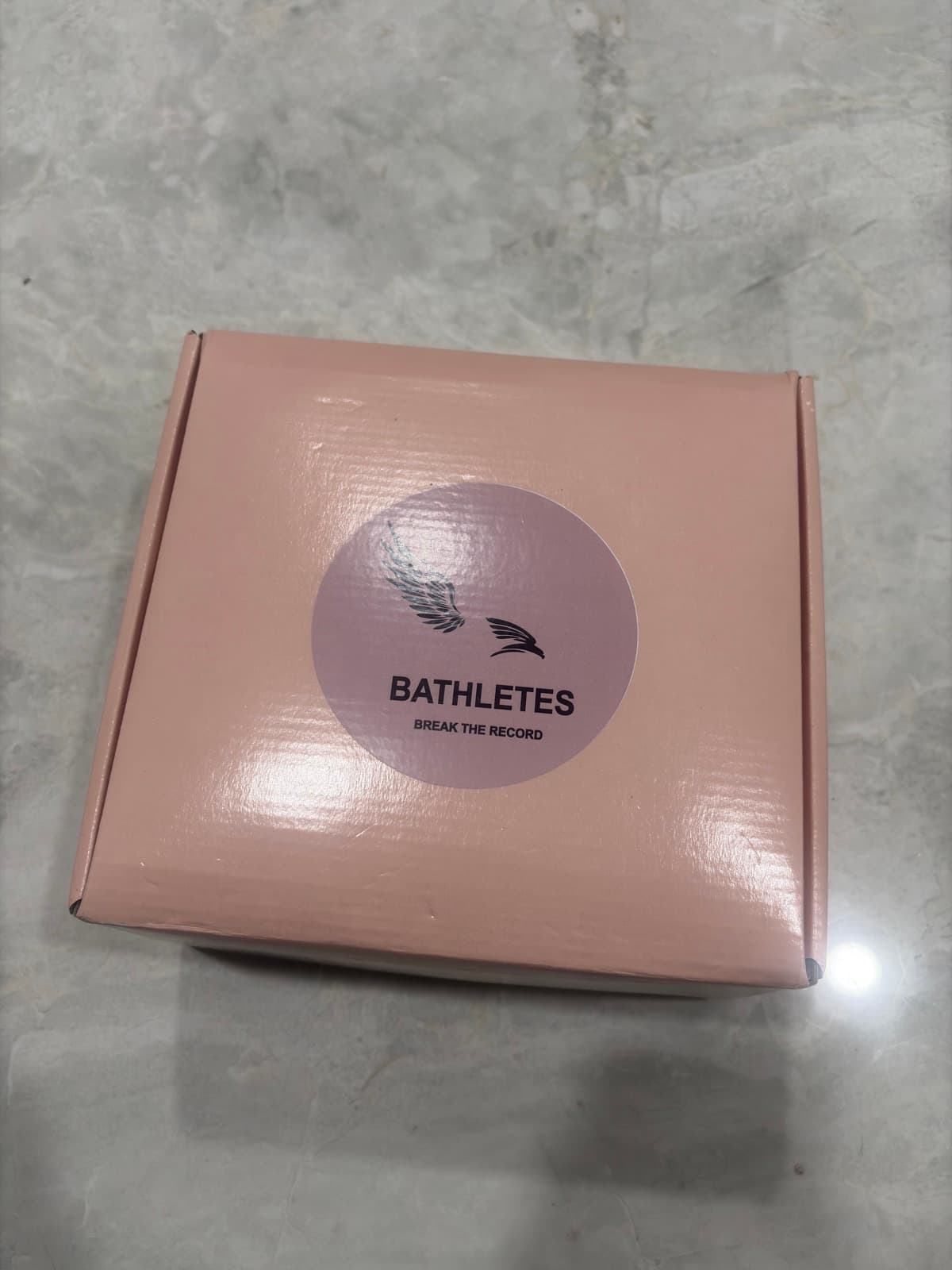 BATHLETES box with falcon logo and Break the Record tagline